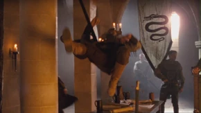 Morgause attacks one of Cenred's soldiers.