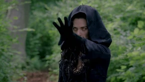 The Priestess prepares to use magic.