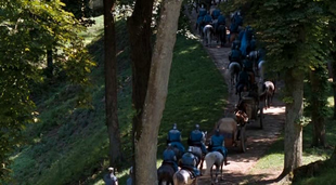 as Bayard and his men ride away from Camelot