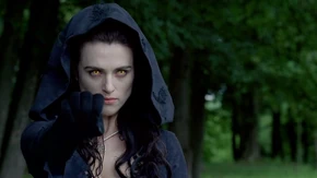 Morgana casts a spell to pull the Queen back.