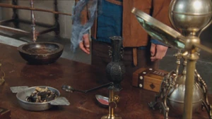 Edwin echants the blue powder.