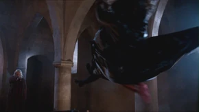 Gaius attacks Morgause to save Merlin.