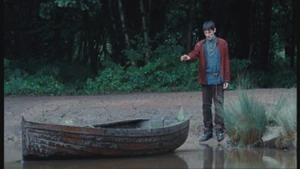 Emrys makes the boat with his lover's body move.