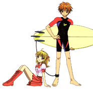 Lucia and Kaito with surfing board