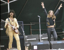 Tony Iommi and Ozzy Osbourne on stage at the  festival on April 6, 1974. Portions of the show were telecast on ABC in the US, exposing the band to a new audience.