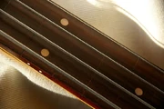 An example of a fretless bass's fingerboard.