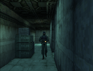 A heavily armed trooper patrols the armory in Metal Gear Solid.