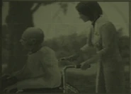 Radio image 1: Para-Medic helping a man in a wheelchair.