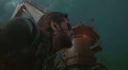 Sniper Quiet lights Venom Snake's cigar by shooting it.