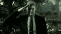 Solid Snake saluting Big Boss's grave at Arlington.