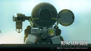 Metal Gear ZEKE charging the railgun. Equipped with all standard ZEKE main and optional components but with the head and legs of Peace Walker. Normal color scheme. Photographer has taken cover to avoid a potentially fatal hit.