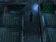 Snake sneaking around the cargo hold of the island in Metal Gear Solid.