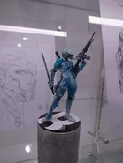 Metal Gear Solid 2 Raiden model with a Metal Gear Rising sketch in the background.