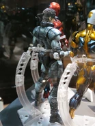 Solid Snake Play Arts Kai figure from the back