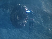 Shaider stabbing Kubilai's weak point. The Third Eye.