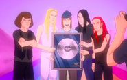 Dethklok receiving their "super platinum" award for the album