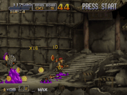 Once all six spots are shot, shoot the center of the sign. Two POWs with Point Items walk in alongside a horde of Invaders.