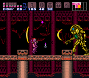 Samus Aran battling the Golden Torizo in its chamber