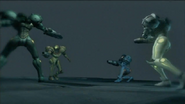 All four players square off in a Metroid Prime Trilogy cinematic. The Houston-like color is second from the right.
