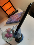 Manchester's Metroid larva amiibo, in which he keeps his Wacom pen.[12]