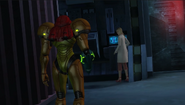 Samus corners the woman.