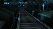 Samus ascends a steep staircase to the Exam Center tower.