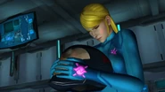 Zero Suit Samus Adam Helmet.png (2.02 MB) Samus holds the late Adam's helmet.