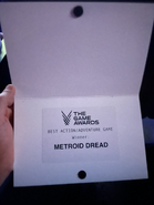 The Game Awards' Best Action Adventure Game winner card.[148]