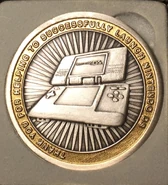 Moneda para conmemorar el lanzamiento de la Nintendo DS