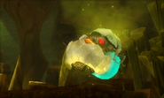 An Alpha Metroid emerging from its Metroid Husk in Samus Returns