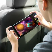 The Switch is displaying a superimposed image from Metroid: Samus Returns (for the Nintendo 3DS) in this photo.[13]