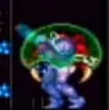 Un metroide absorbiendo energía a Samus.