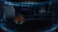 Samus encontrando una Cría de Metroid en la entrada del Sector 0.