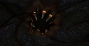 The hole from which Metroid Prime was suspended. Similar in appearance to the holes from which the Phazon Cores descend (bar the teeth).