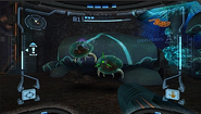 Samus faces two Tallon Metroids in the Phazon Mines.