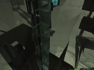 The elevator shaft seen using Out of Bounds. Three unopened elevator doors can be spotted below the fourth door at the top.