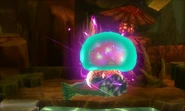 A Metroid larva attacking a Hornoad