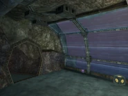 The room with the force field view. Contains a small Energy Capsule, a missile pick-up, and a crate .