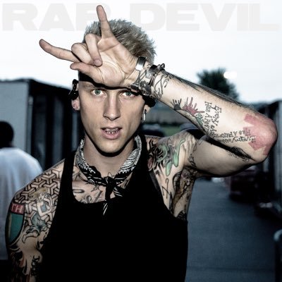 mgk stomach tattoos