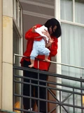 Bigi with Michael during the balcony incident (2002)
