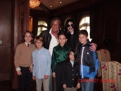 '"`UNIQ--nowiki-00000000-QINU`"', ,  and  with real estate developer Mohamed Hadid and his children in Thriller Villa (November 2008)