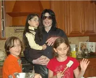 Michael, Paris, Prince, and Bigi in the mansion's kitchen (2008)