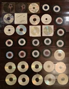 A collection of CDs from the late 2000s