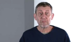 Michael doing a face that looks similar to the 'Not Bad' meme from Barack Obama. A frame taken from a Michael Rosen Poetry Friendly Classroom video.