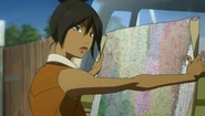 Michiko looking at a map