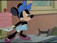 Upset minnie with cake