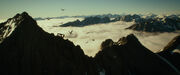 Eagles flying over mountains
