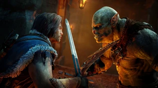 Talion facing a large Uruk.