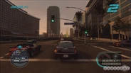 A Chrysler 300C races past Olympic Boulevard in in-game Los Angeles.