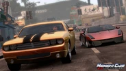 A Dodge Challenger and Lamborghini Gallardo Spyder race in in-game Hollywood.